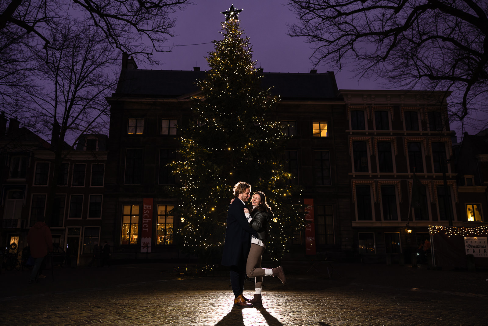 Royal Christmas Market Lange Voorhout The Hague Engagement Session couple by Christmas Tree