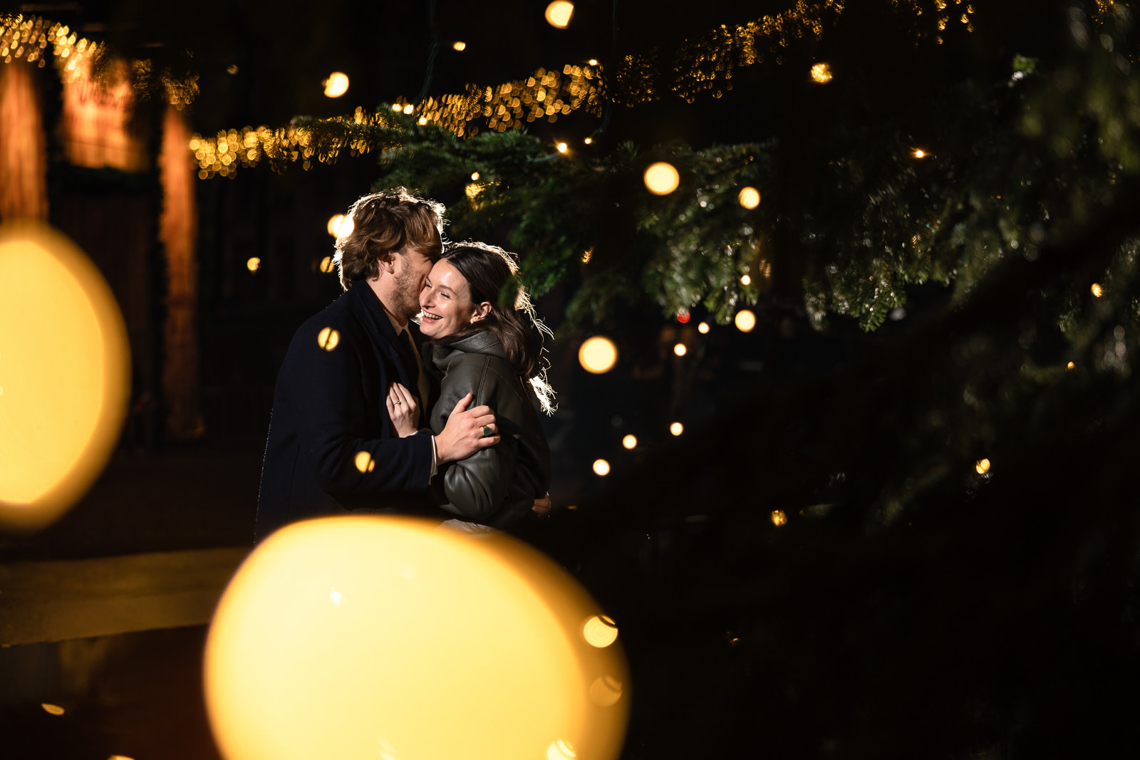 Royal Christmas Market Lange Voorhout The Hague Engagement Session Couple hugging 